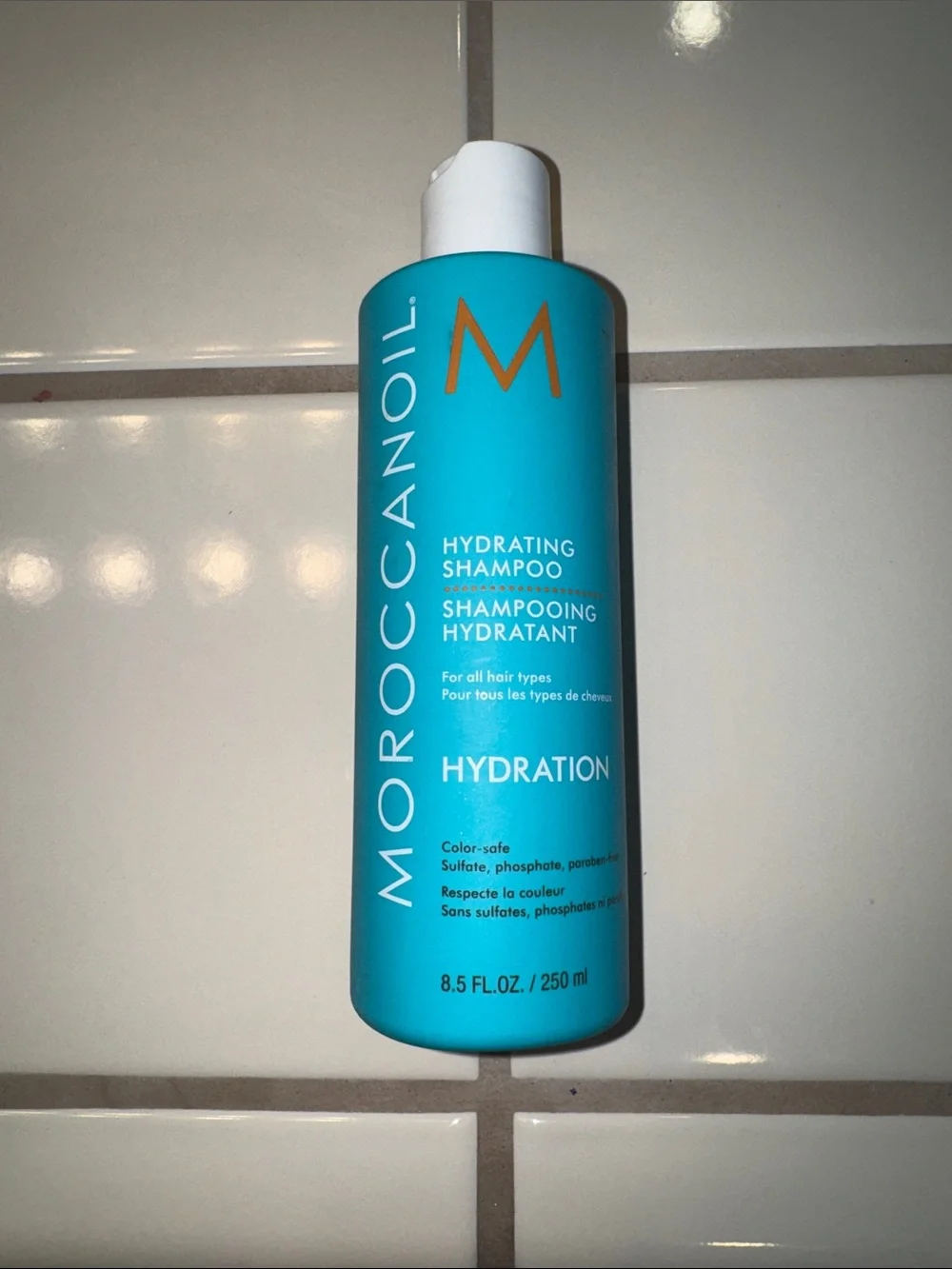 Moroccanoil Hydration Shampoo - Bright Turquoise Bottle with Orange Logo